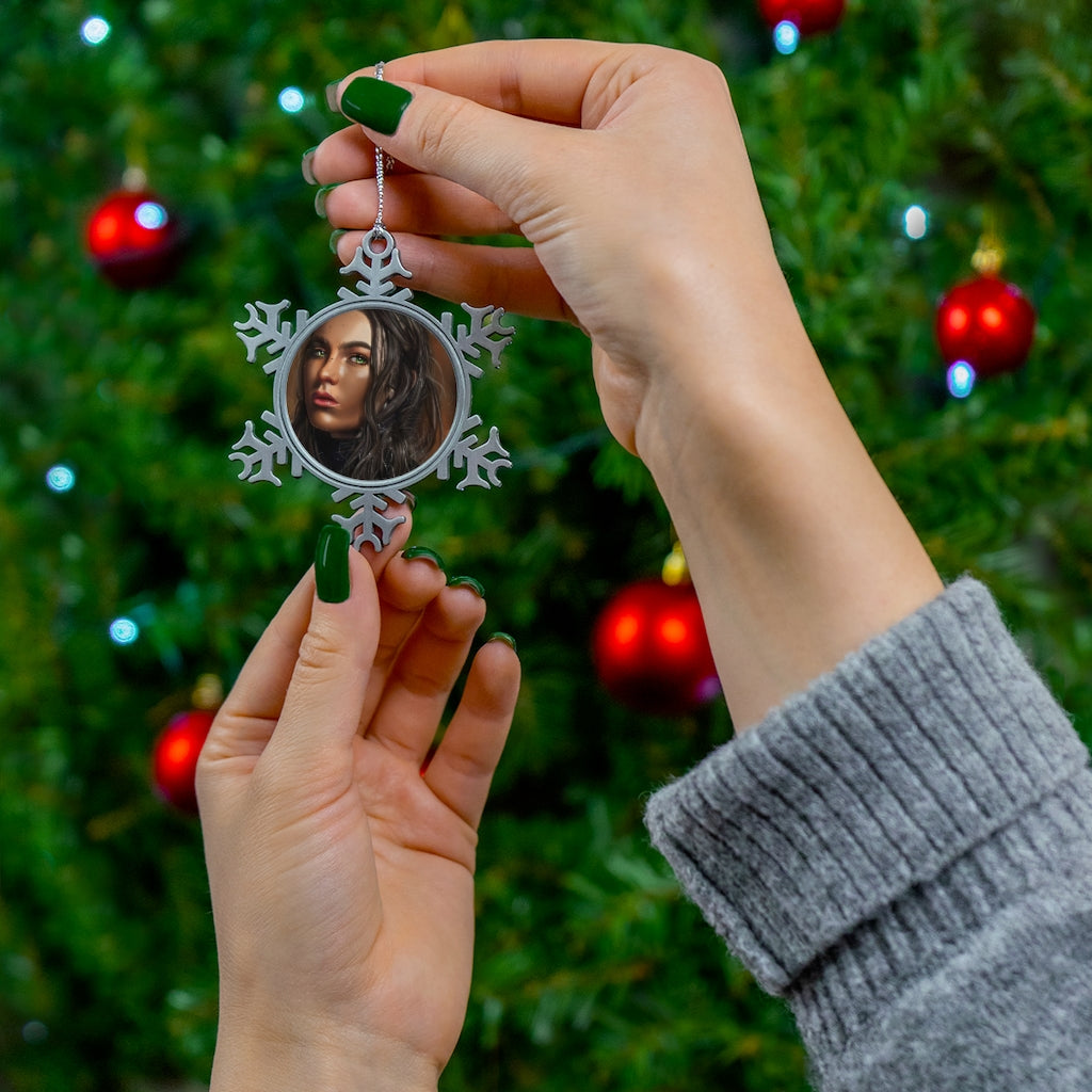 A beautifully crafted Girl Pewter Snowflake Ornament featuring intricate snowflake design and a silver-toned hanging string.