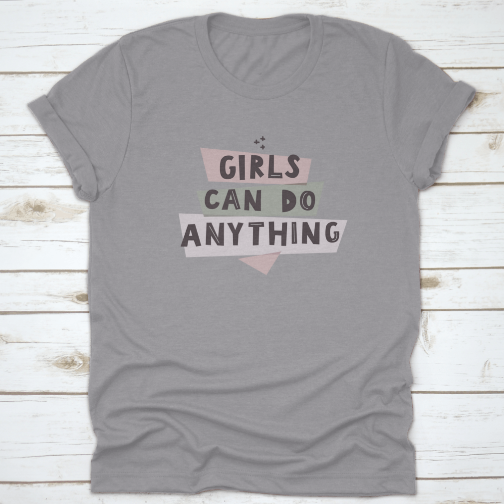 Colorful Girls Can Do Anything shirt featuring a feminist quote, made from 100% cotton with a classic fit.