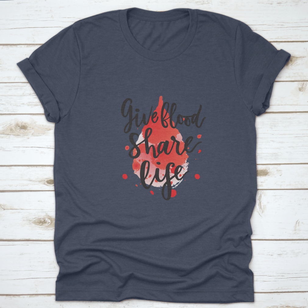A stylish t-shirt featuring a watercolor drop design with the phrase 'Give Blood Share Life', made from 100% cotton for comfort.