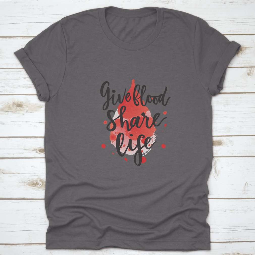 A stylish t-shirt featuring a watercolor drop design with the phrase 'Give Blood Share Life', made from 100% cotton for comfort.