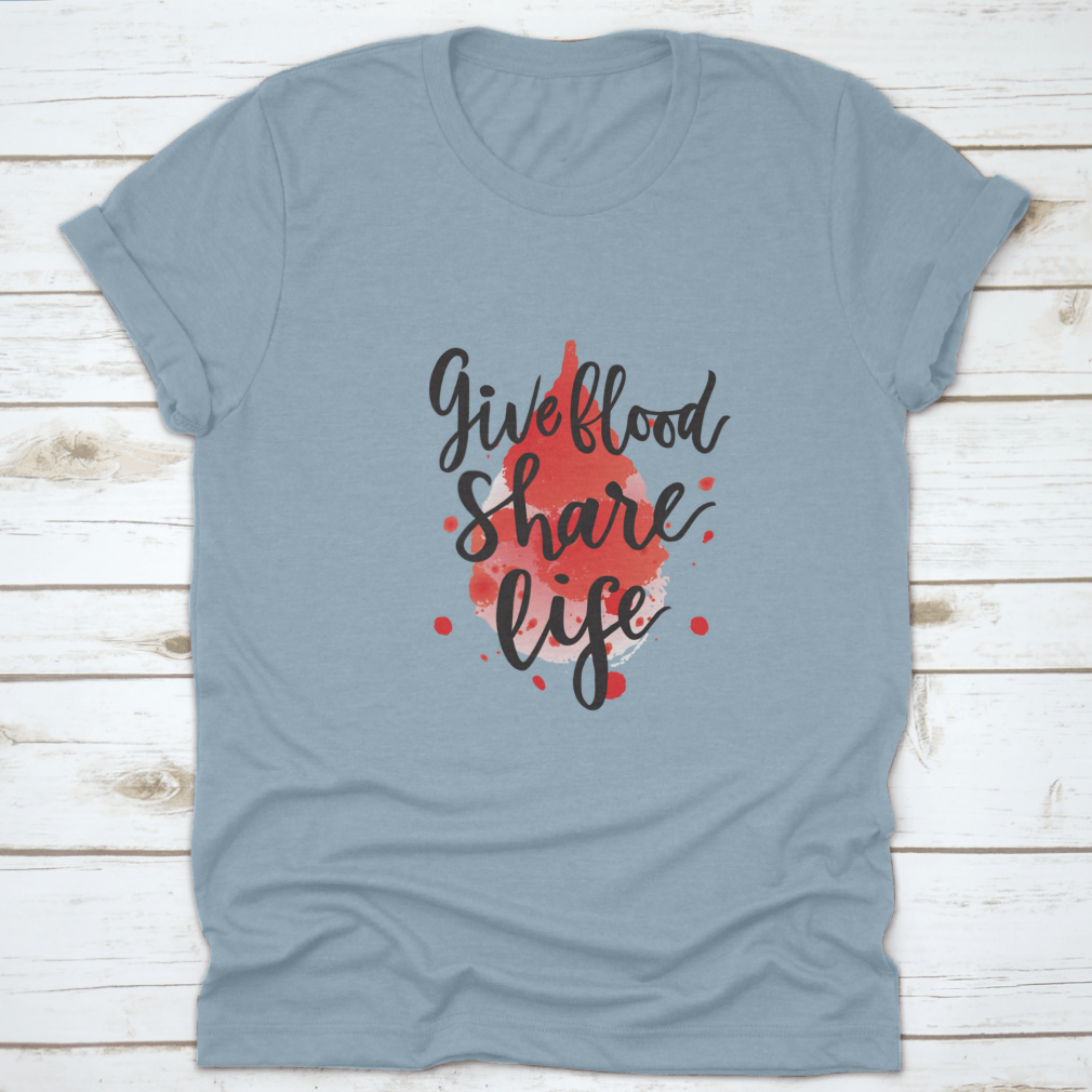 A stylish t-shirt featuring a watercolor drop design with the phrase 'Give Blood Share Life', made from 100% cotton for comfort.