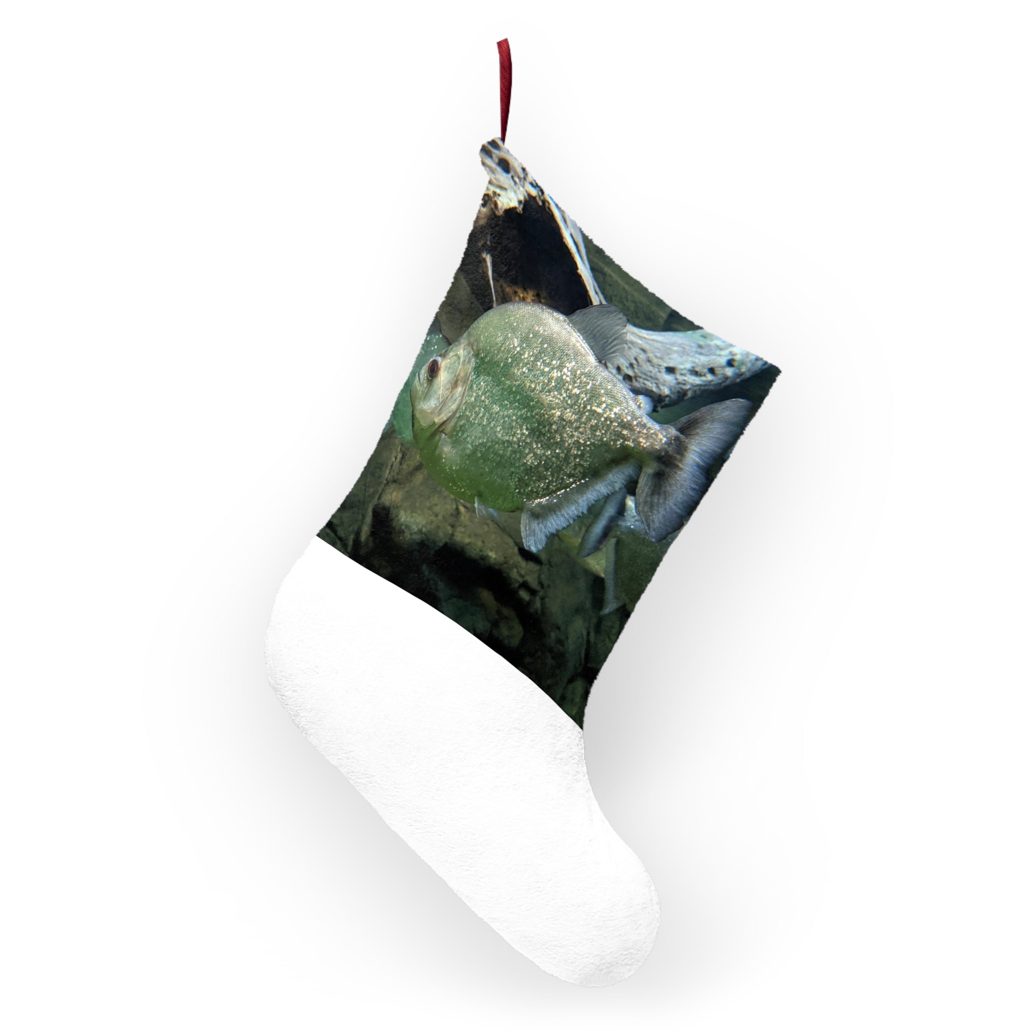 Glitter Green Fish Christmas Stockings hanging by a fireplace, showcasing their vibrant color and festive design.