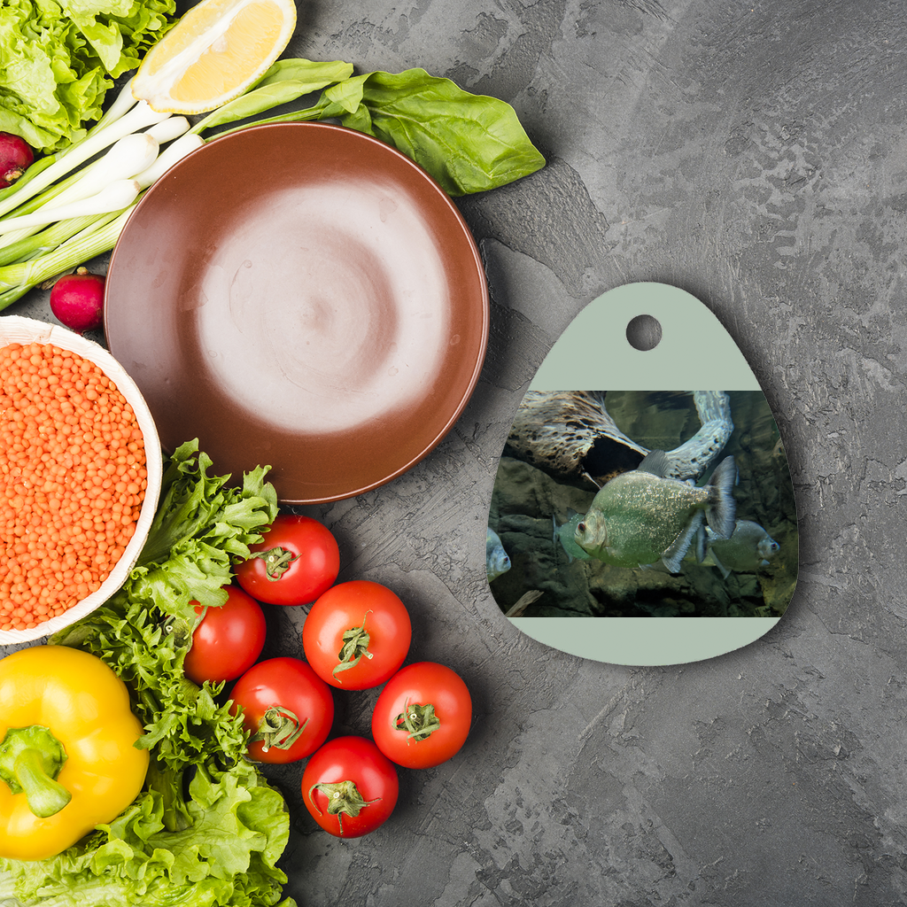 Glitter Green Fish Sublimation Glass Cutting Board with vibrant colors and a round shape, showcasing a unique design for culinary use.