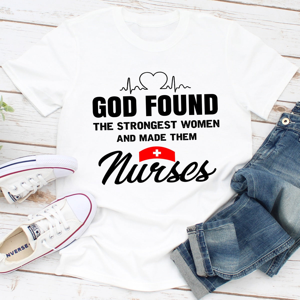 A comfortable t-shirt featuring the phrase 'God Found The Strongest Women And Made Them Nurses', made from soft ring-spun cotton.