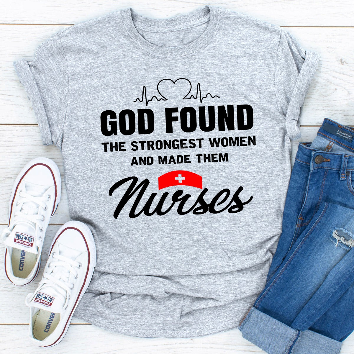 A comfortable t-shirt featuring the phrase 'God Found The Strongest Women And Made Them Nurses', made from soft ring-spun cotton.