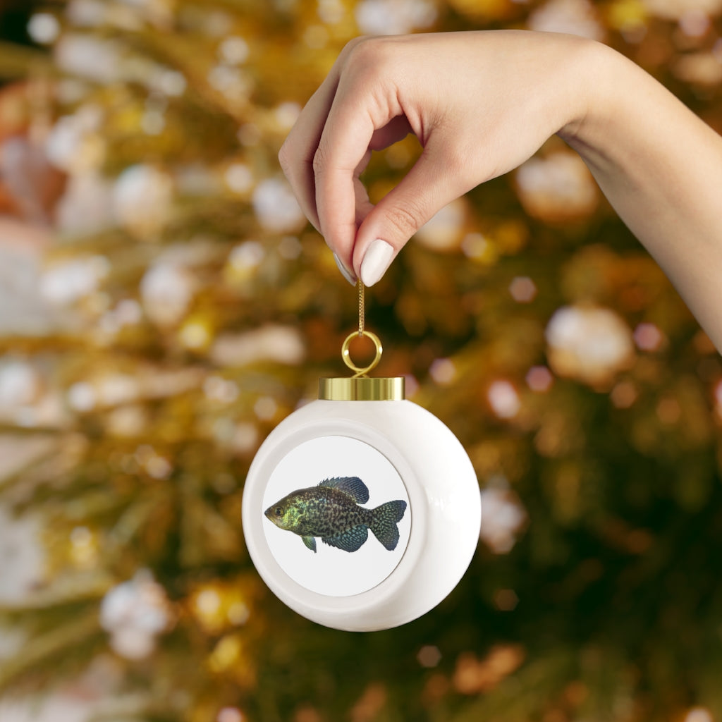 Golden Fish Christmas Ball Ornament with glossy finish and gold ribbon, perfect for holiday decor.
