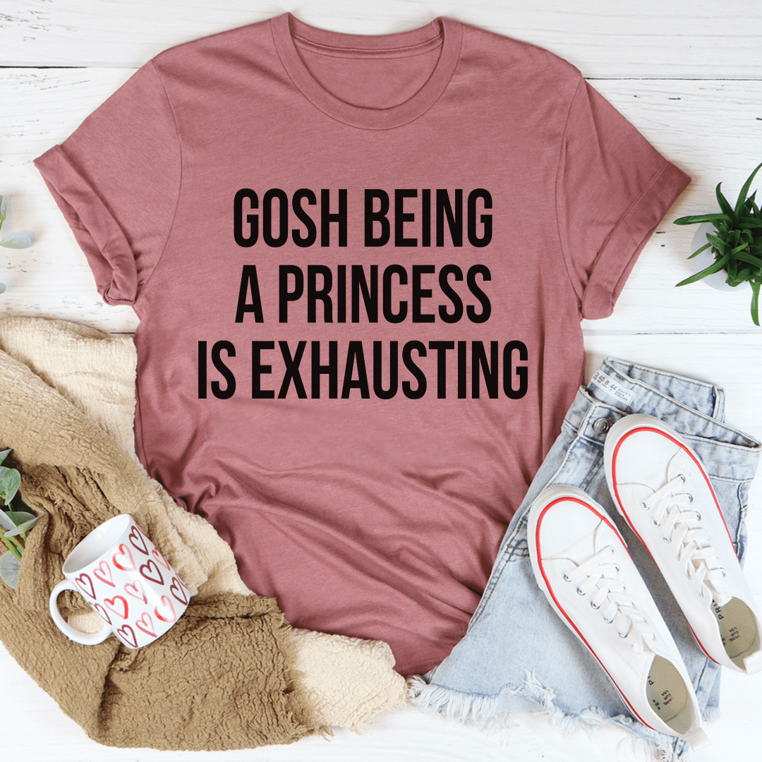 Gosh Being A Princess Is Exhausting T-Shirt displayed on a mannequin, showcasing its soft cotton fabric and playful design.