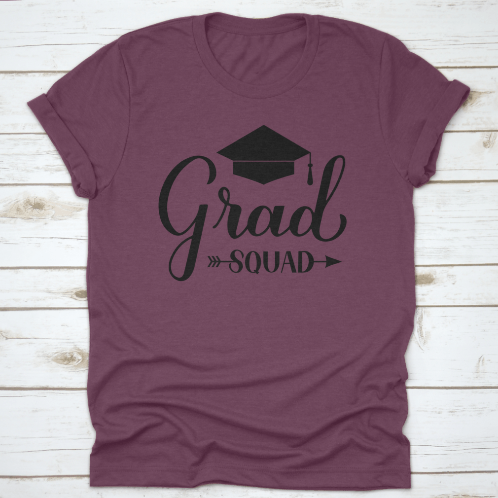 Grad Squad Calligraphy T-Shirt featuring a graduation cap design, made from 100% cotton for comfort and style.