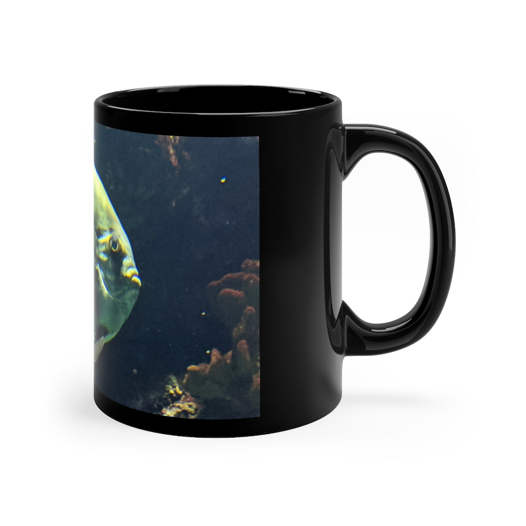 Green Fish 11oz black ceramic mug with a C-handle, perfect for coffee, tea, or hot chocolate.
