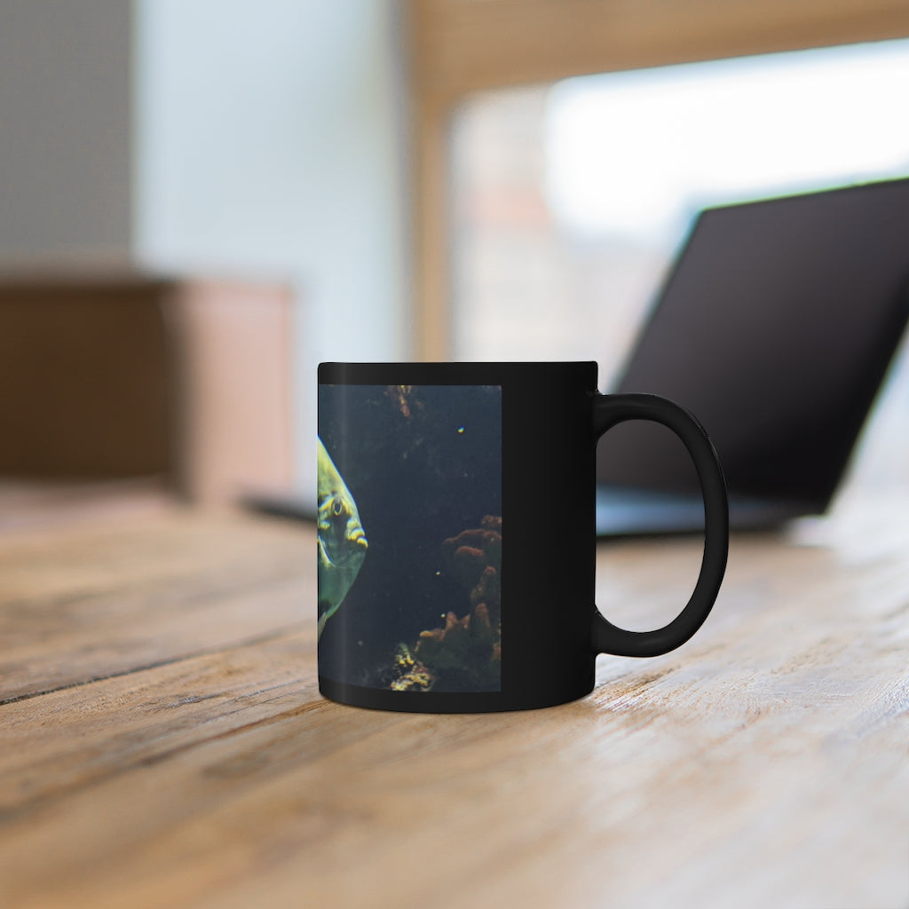 Green Fish 11oz black ceramic mug with a C-handle, perfect for coffee, tea, or hot chocolate.