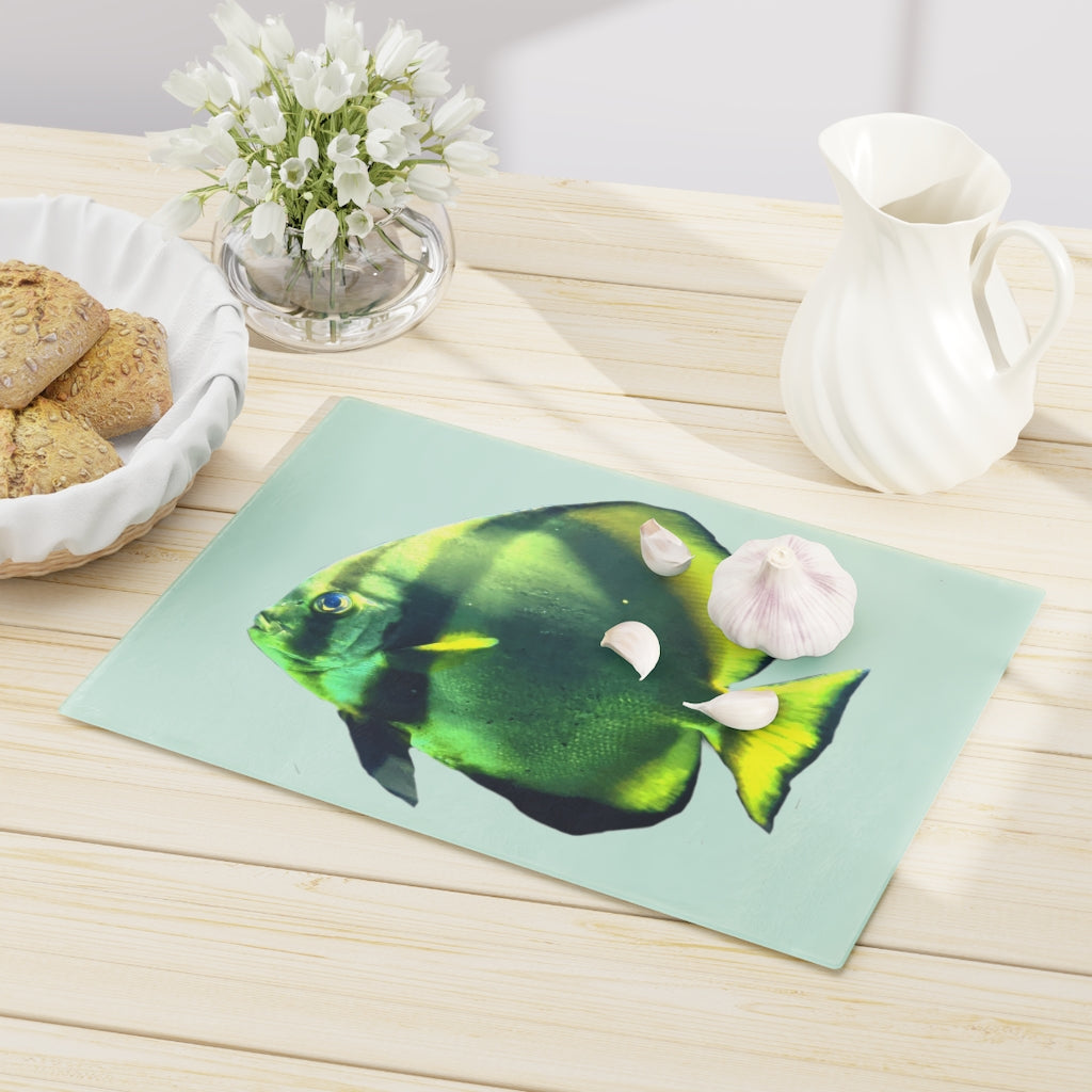 Green Fish Cutting Board made of tempered glass with rubber dots for stability, featuring a vibrant fish design.