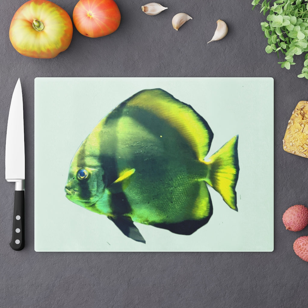 Green Fish Cutting Board made of tempered glass with rubber dots for stability, featuring a vibrant fish design.