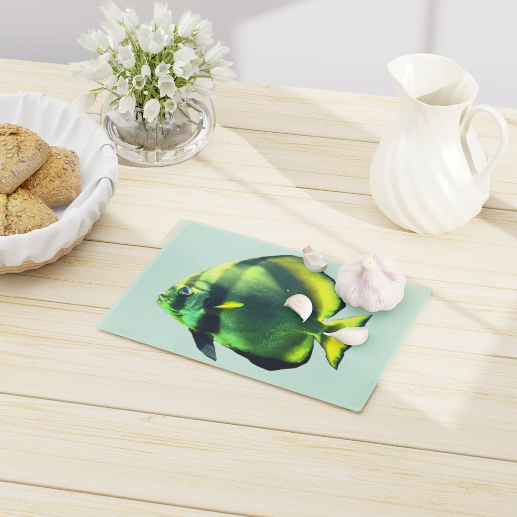 Green Fish Cutting Board made of tempered glass with rubber dots for stability, featuring a vibrant fish design.