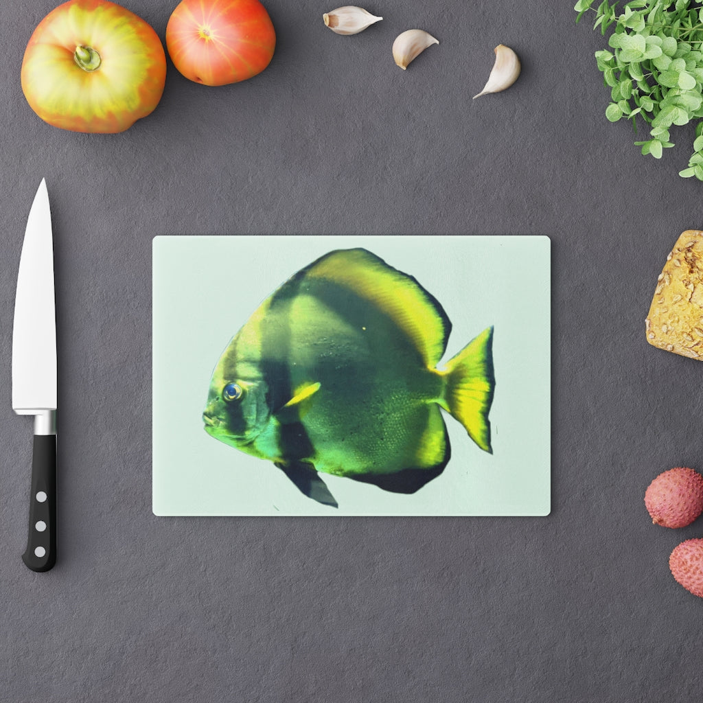 Green Fish Cutting Board made of tempered glass with rubber dots for stability, featuring a vibrant fish design.