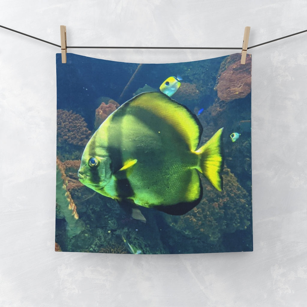 Green Fish Face Towel featuring a vibrant printed design on a soft polyester front and absorbent cotton back, ideal for personal use or gifting.