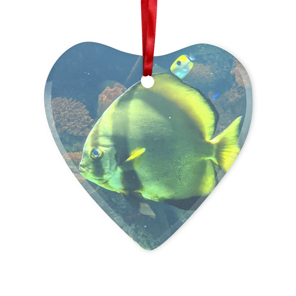 A beautifully crafted Green Fish Glass Hanging Ornament with a red ribbon and gold string, showcasing its unique design and elegant finish.
