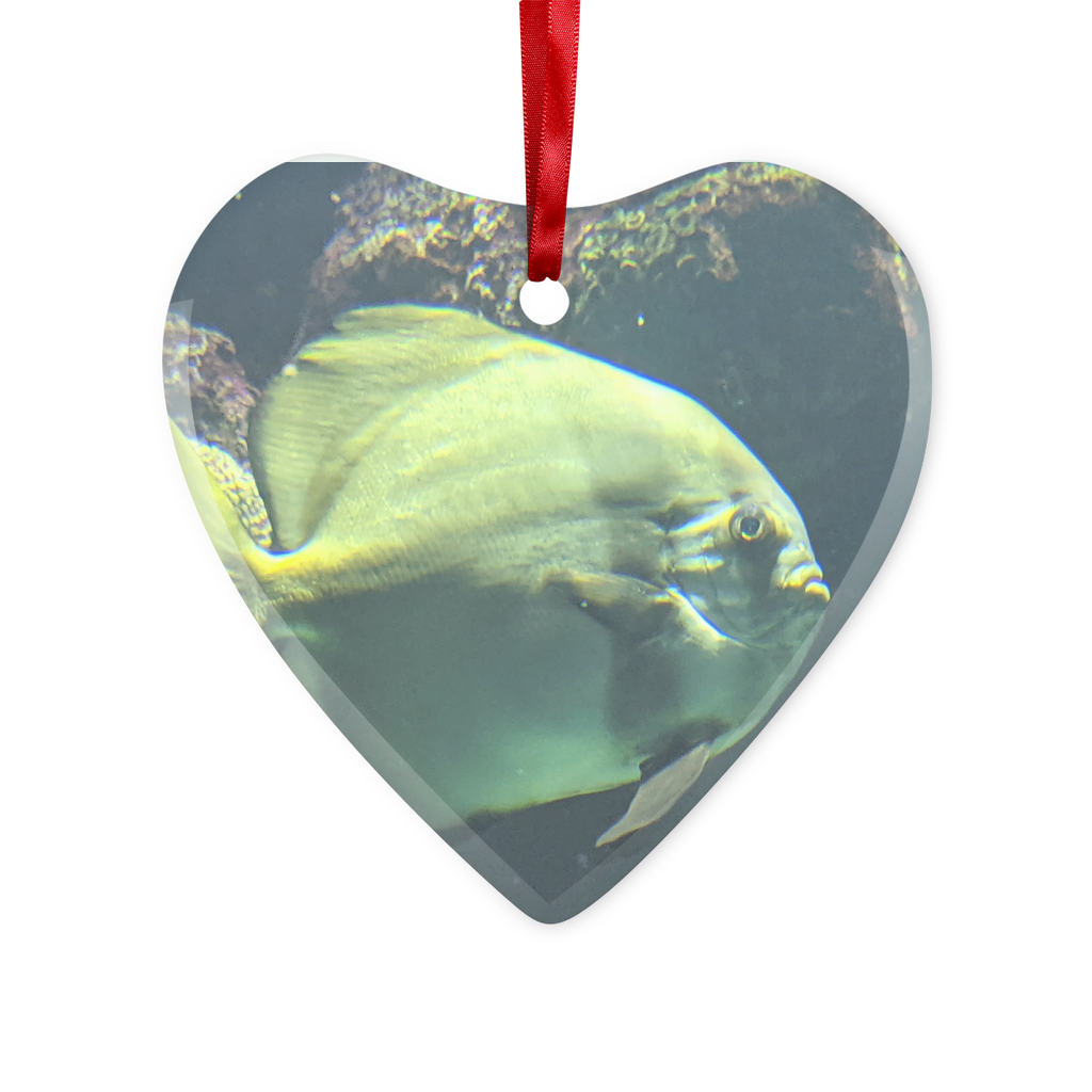 A beautiful green fish glass hanging ornament with a red ribbon and gold string, perfect for Christmas decoration.