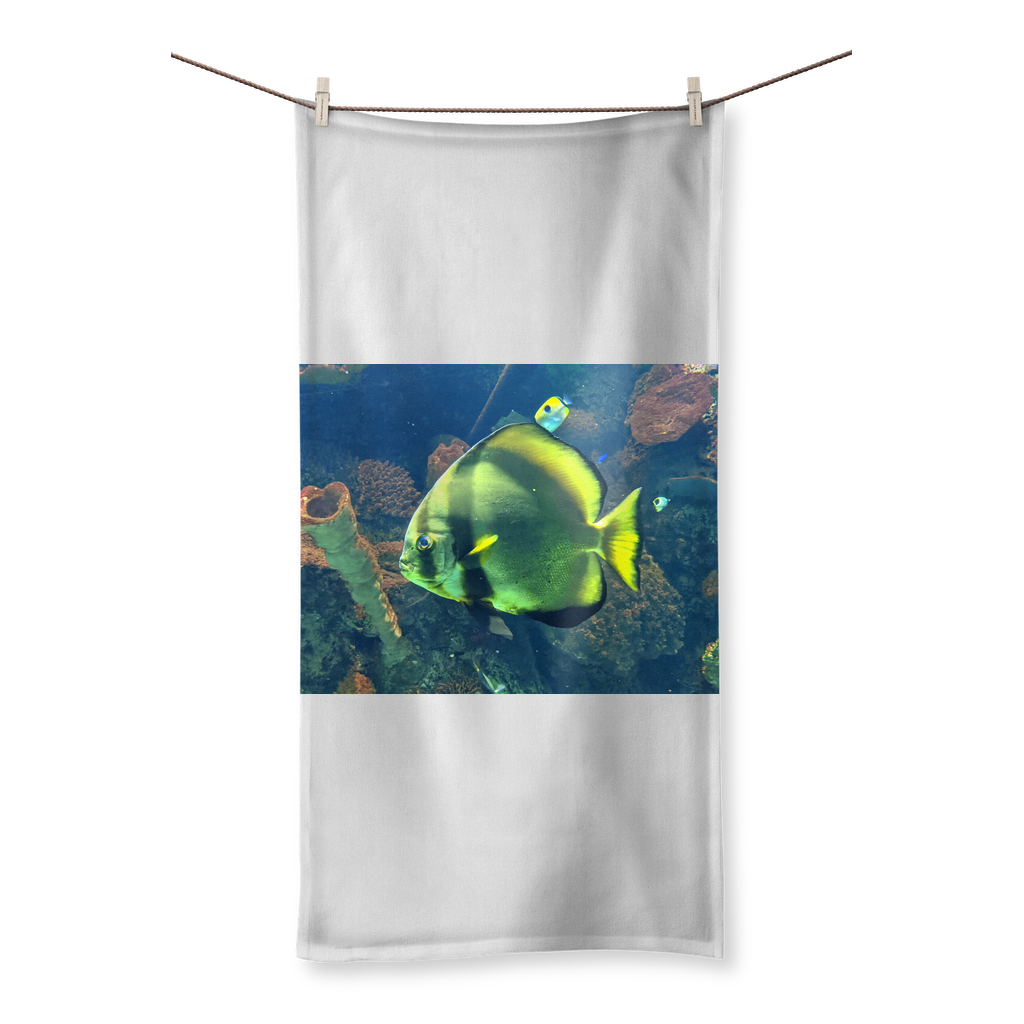Green Fish Sublimation All Over Towel showcasing vibrant colors and soft cotton backing, ideal for beach or bath use.