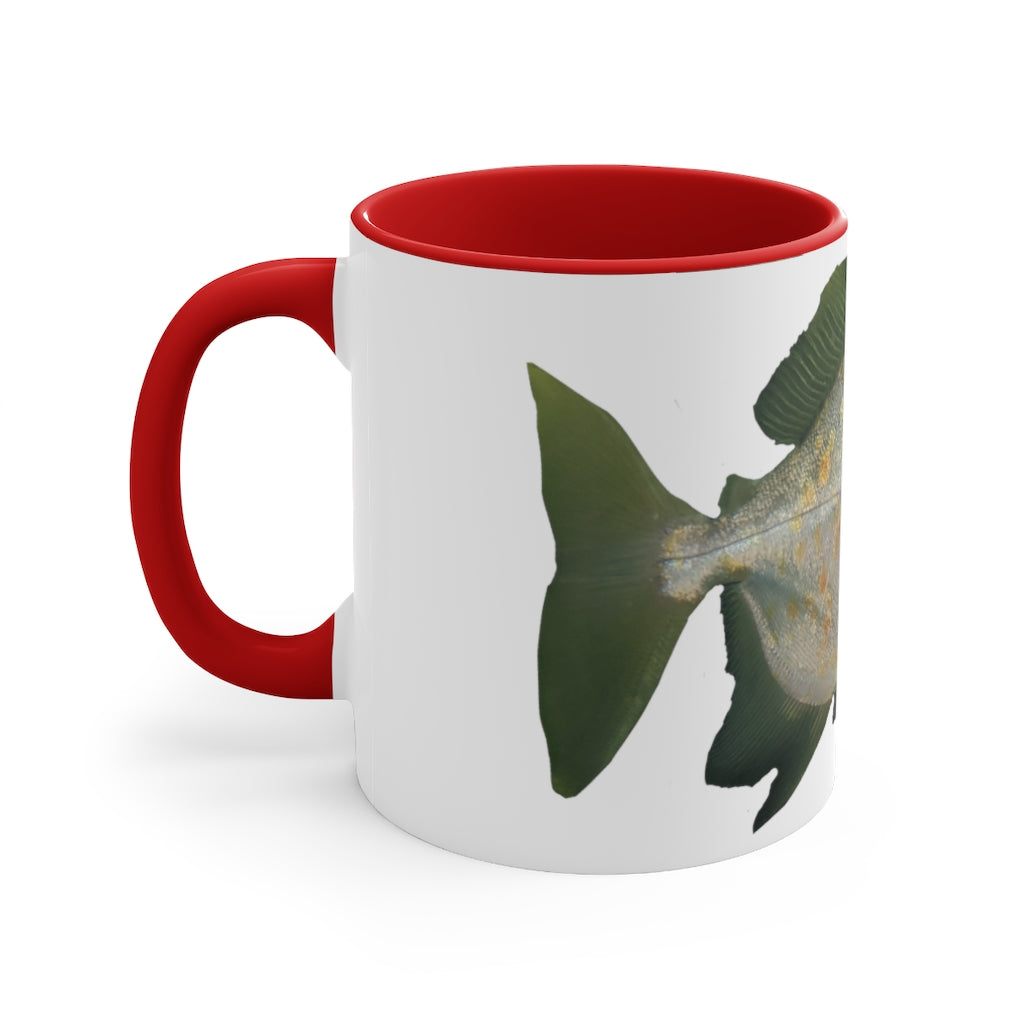A vibrant green fish accent coffee mug with a comfortable C-handle and contrasting interior, perfect for enjoying beverages.