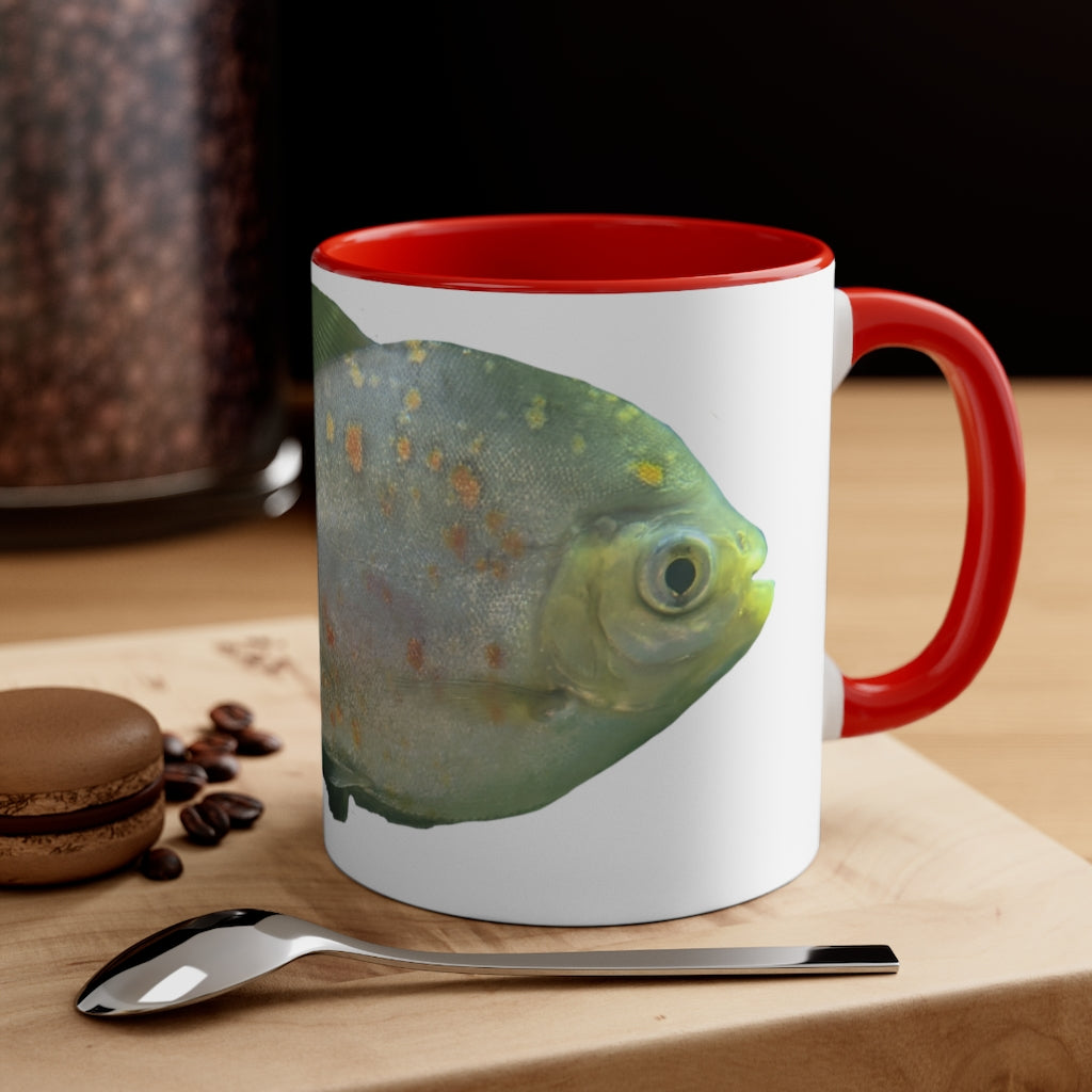 A vibrant green fish accent coffee mug with a comfortable C-handle and contrasting interior, perfect for enjoying beverages.