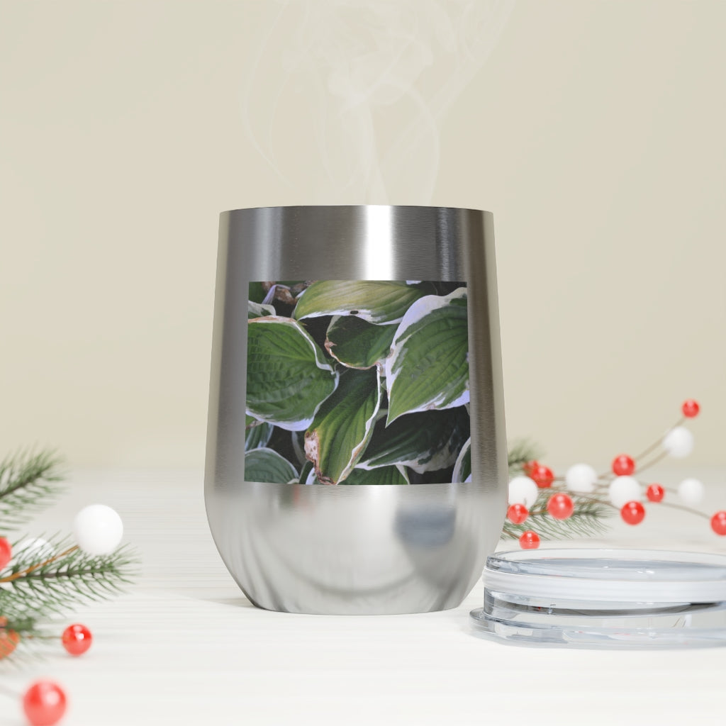 Green Leaves 12oz Insulated Wine Tumbler with clear lid, showcasing vibrant leaf design.