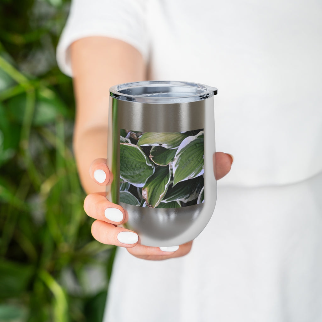 Green Leaves 12oz Insulated Wine Tumbler with clear lid, showcasing vibrant leaf design.