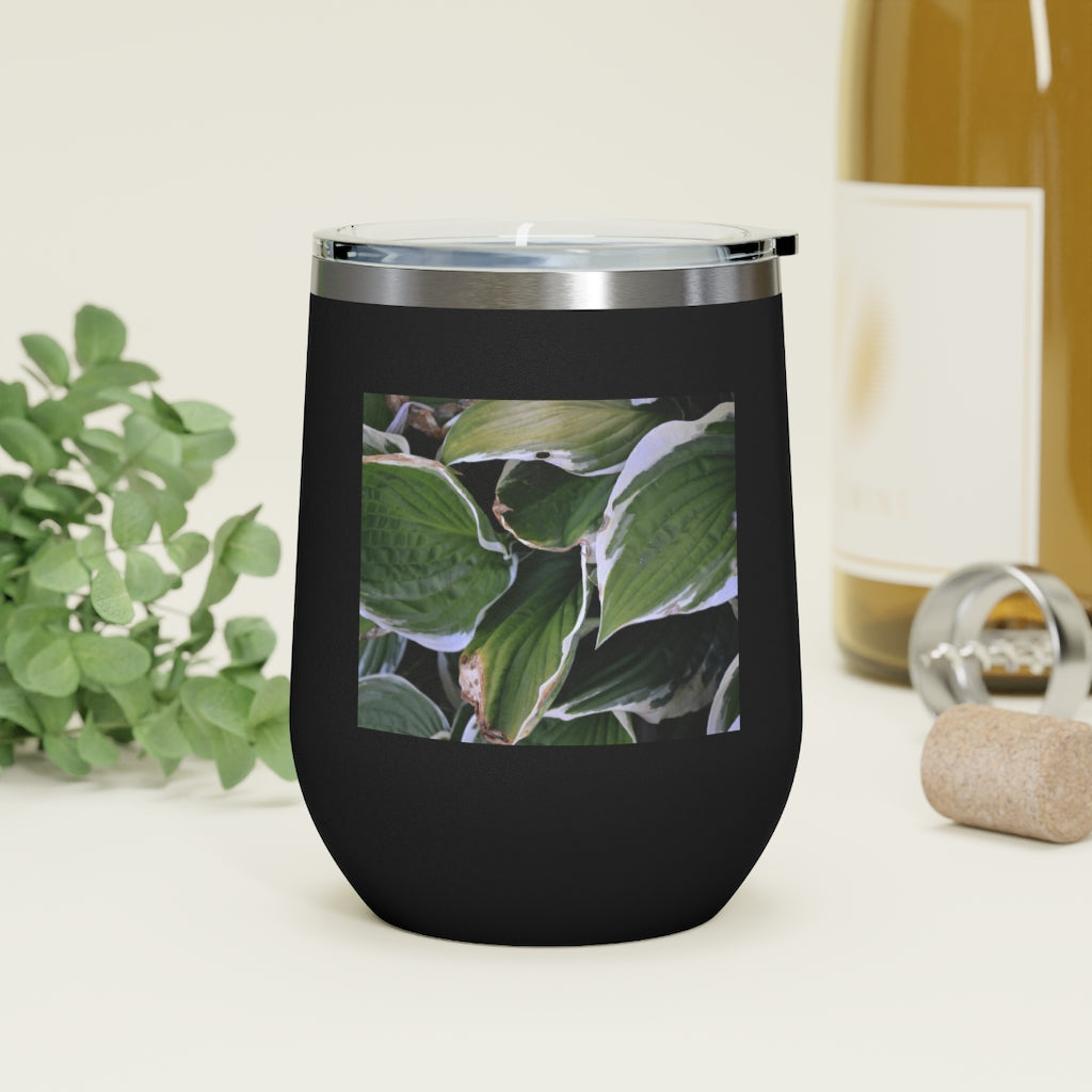 Green Leaves 12oz Insulated Wine Tumbler with clear lid, showcasing vibrant leaf design.