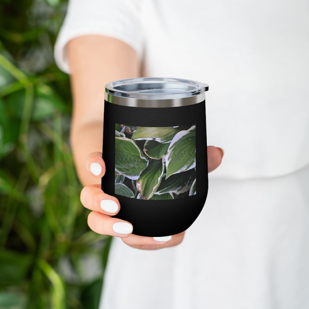 Green Leaves 12oz Insulated Wine Tumbler with clear lid, showcasing vibrant leaf design.