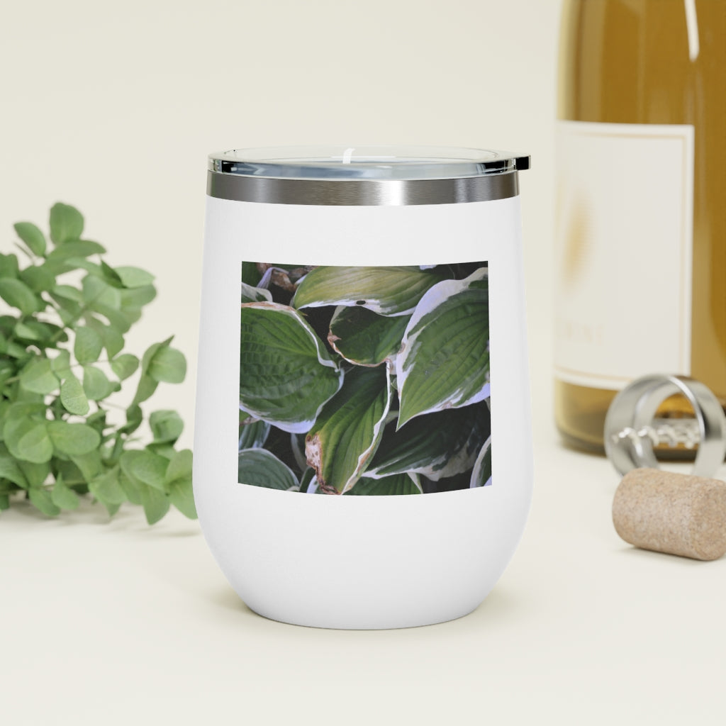 Green Leaves 12oz Insulated Wine Tumbler with clear lid, showcasing vibrant leaf design.