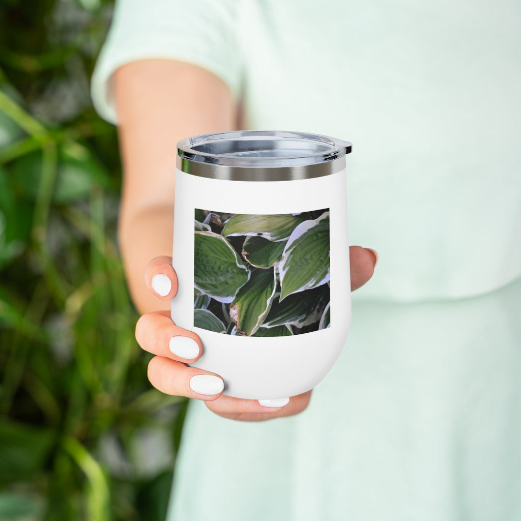 Green Leaves 12oz Insulated Wine Tumbler with clear lid, showcasing vibrant leaf design.