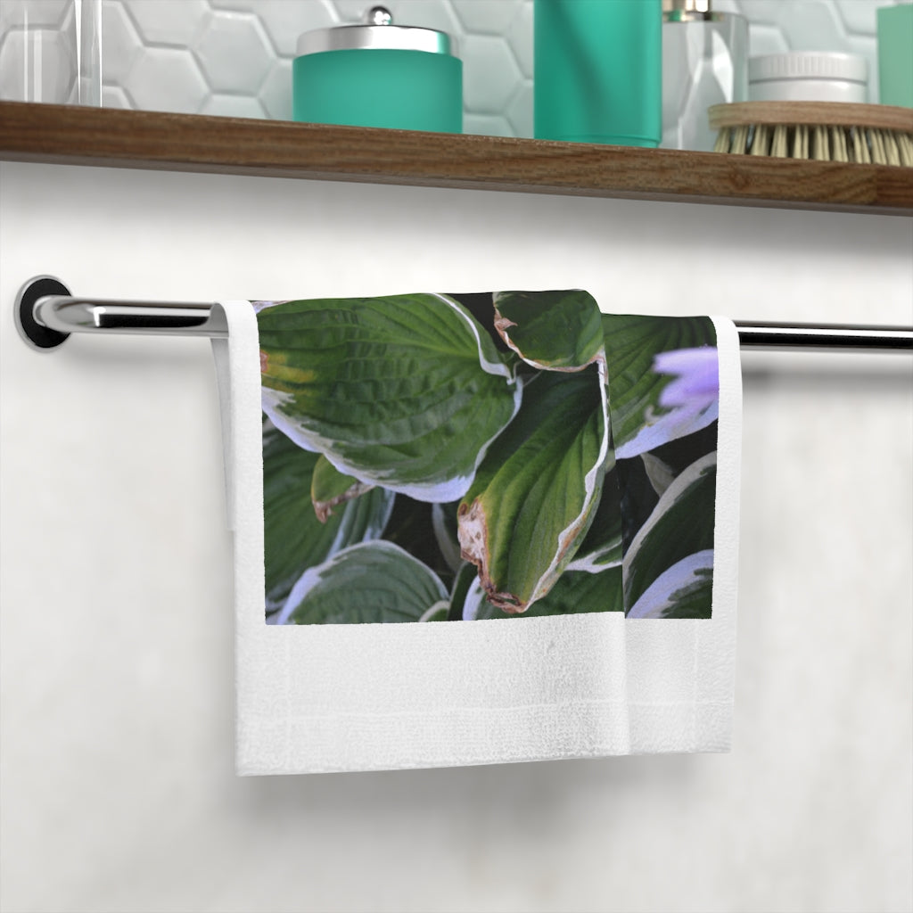 Green Leaves Face Towel featuring a vibrant design on a soft polyester blend front and absorbent cotton back, perfect for daily use.