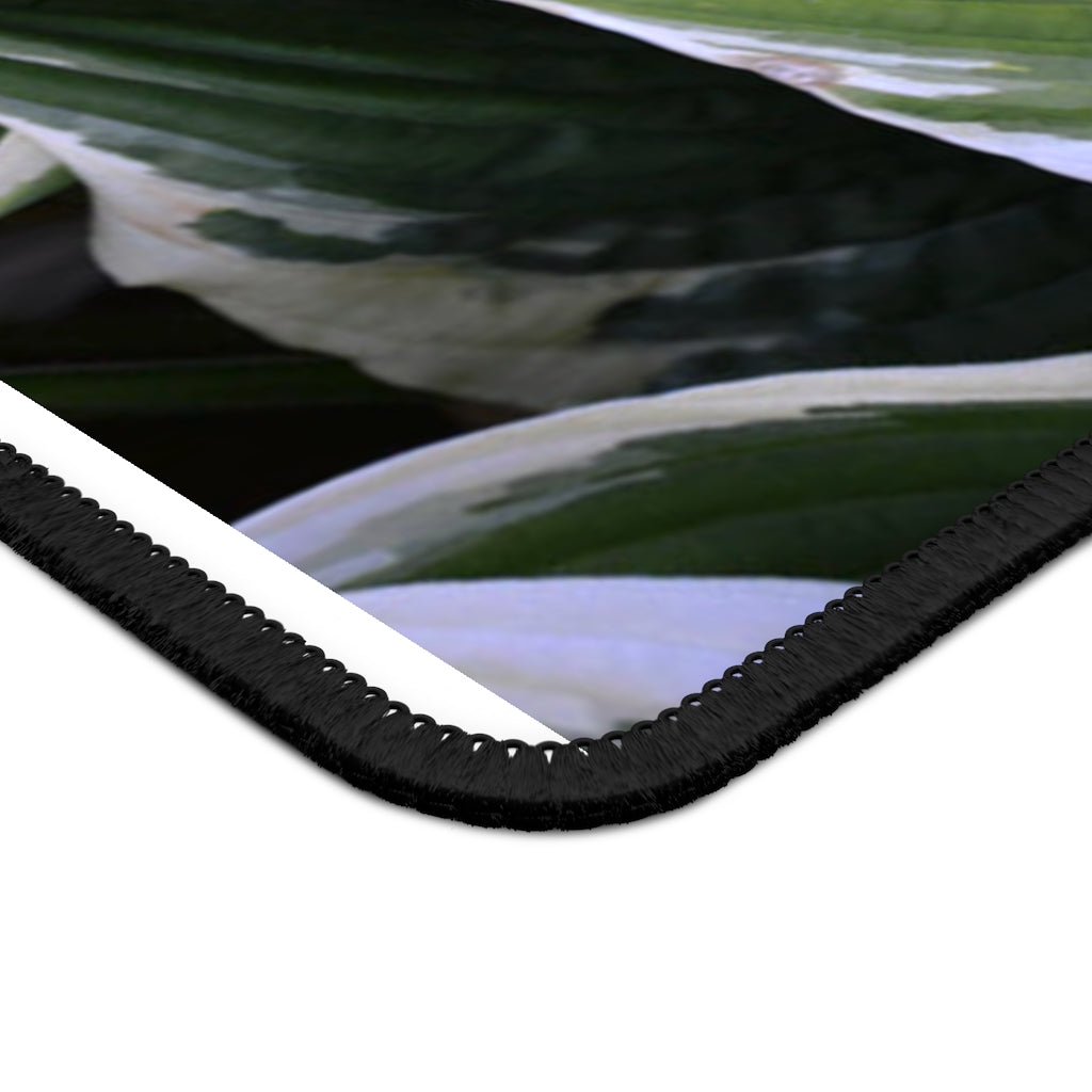 Green Leaves Gaming Mouse Pad featuring vibrant leaf designs and stitched edges, perfect for gaming and office use.