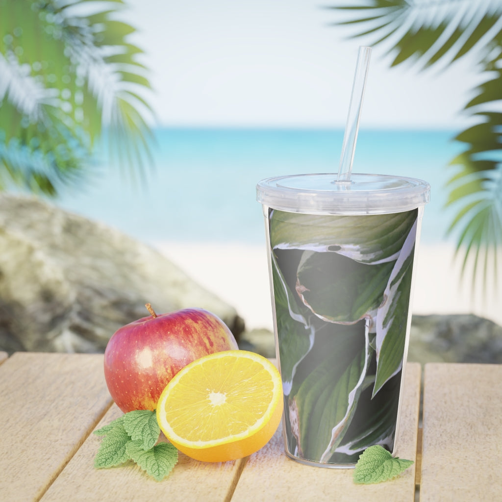 Green Leaves Plastic Tumbler with Straw, featuring a vibrant leaf design and a lid with a reusable straw.