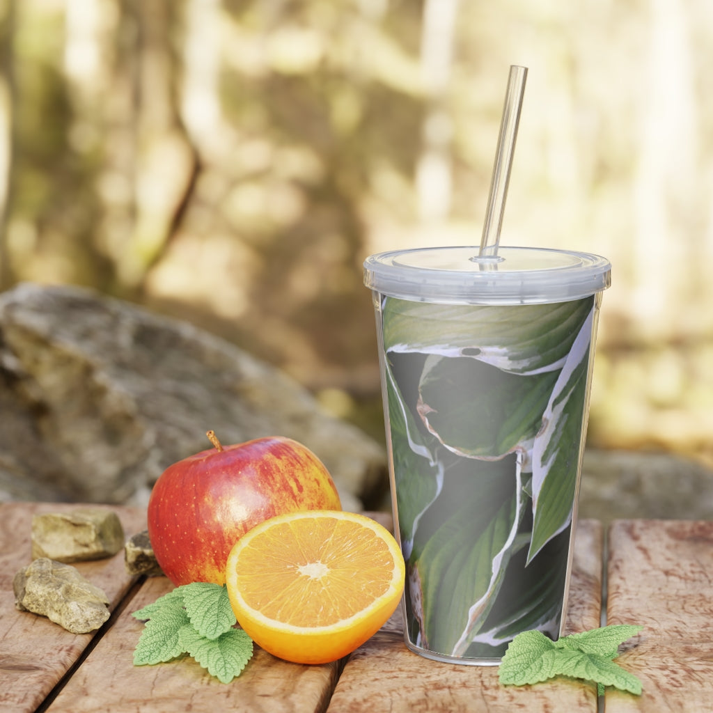 Green Leaves Plastic Tumbler with Straw, featuring a vibrant leaf design and a lid with a reusable straw.