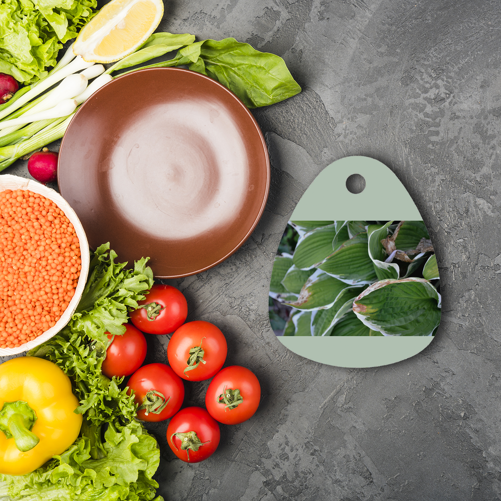 Green Leaves Sublimation Glass Cutting Board with a round shape, featuring a vibrant green leaf design, ideal for custom artwork.