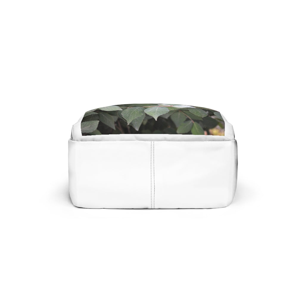 Green Leaves Unisex Classic Backpack featuring a stylish design, adjustable straps, and durable waterproof nylon material.