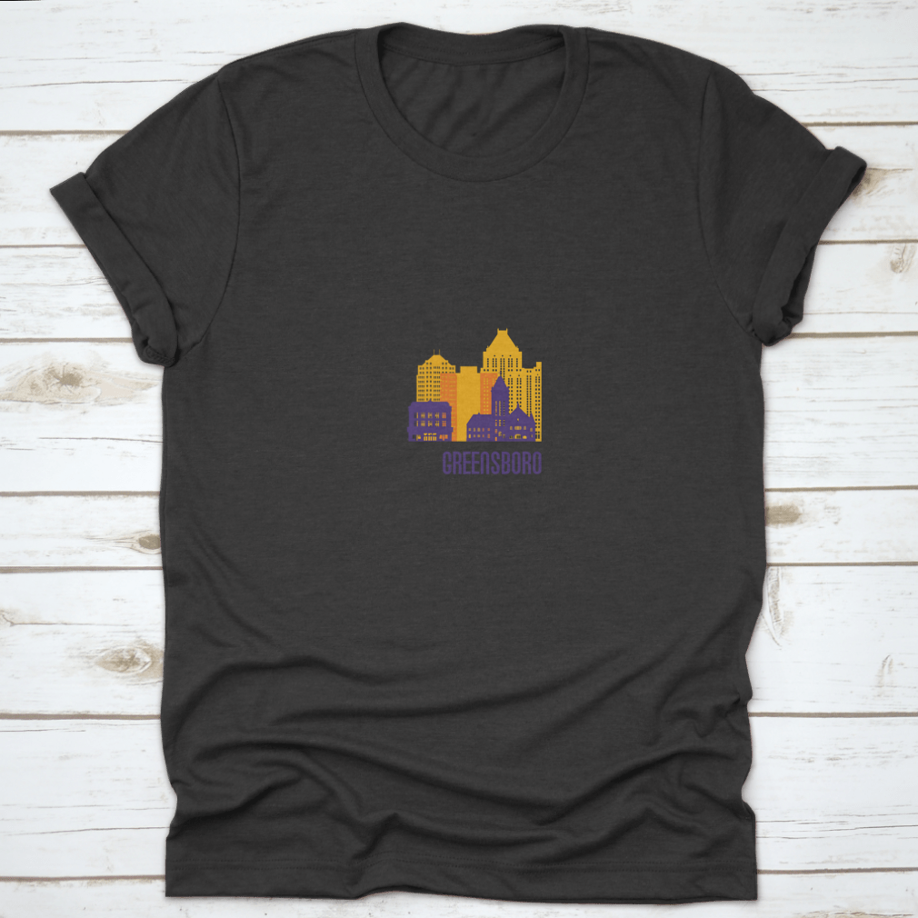 Colorful Greensboro City Emblem T-shirt featuring vibrant buildings, made from 100% cotton.