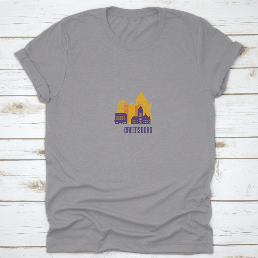Colorful Greensboro City Emblem T-shirt featuring vibrant buildings, made from 100% cotton.