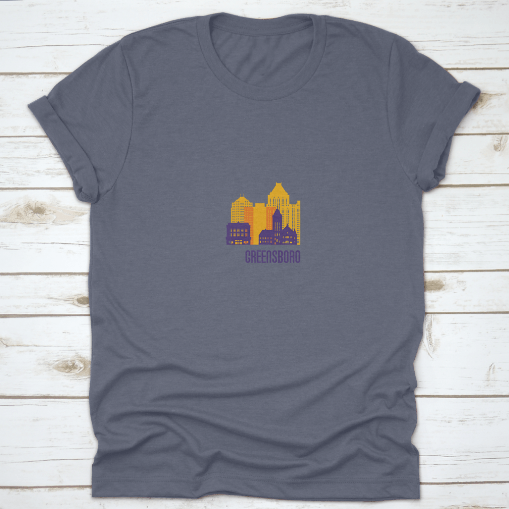 Colorful Greensboro City Emblem T-shirt featuring vibrant buildings, made from 100% cotton.