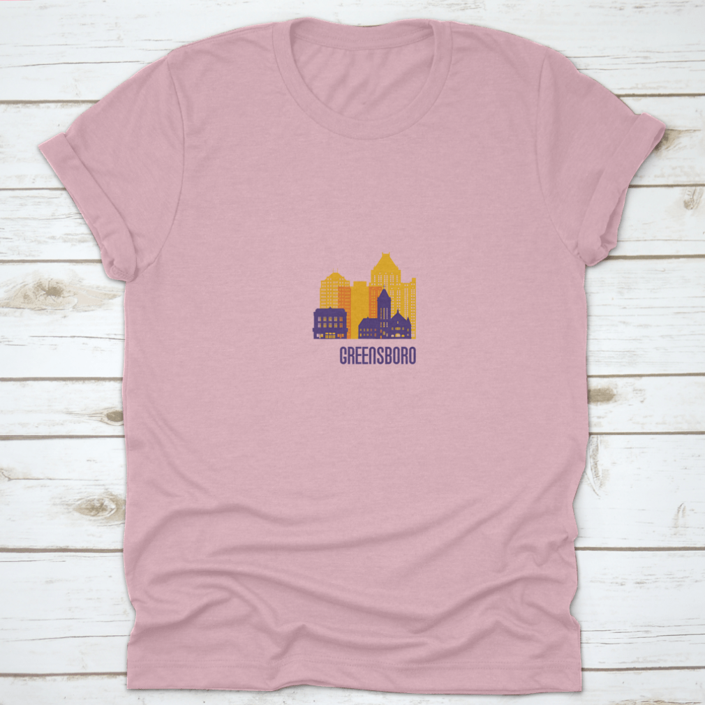 Colorful Greensboro City Emblem T-shirt featuring vibrant buildings, made from 100% cotton.