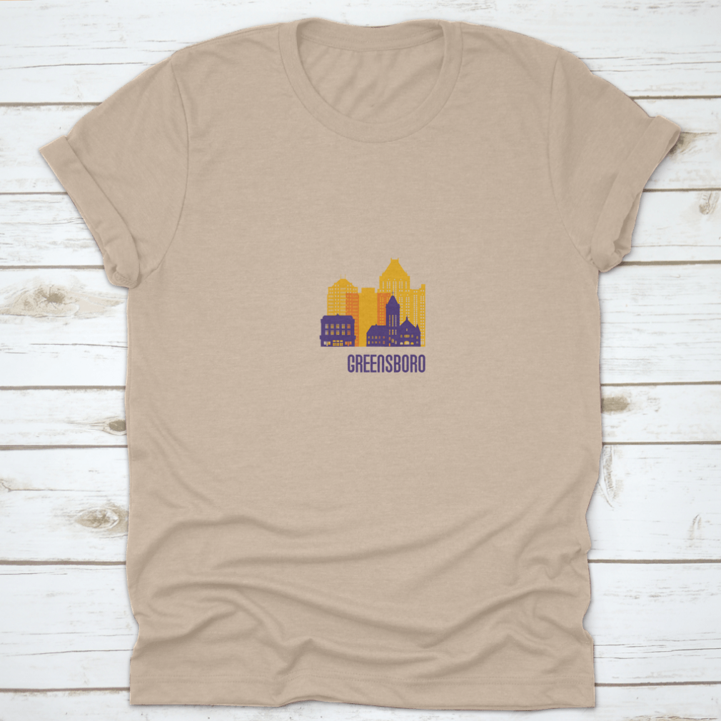 Colorful Greensboro City Emblem T-shirt featuring vibrant buildings, made from 100% cotton.