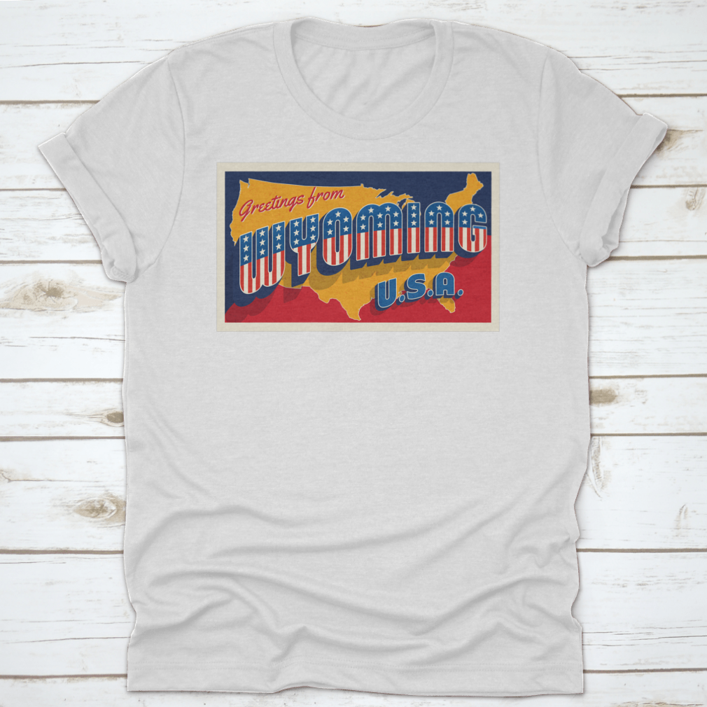 A retro postcard featuring the phrase 'Greetings From Wyoming USA' adorned with patriotic stars, showcasing the beauty of Wyoming.