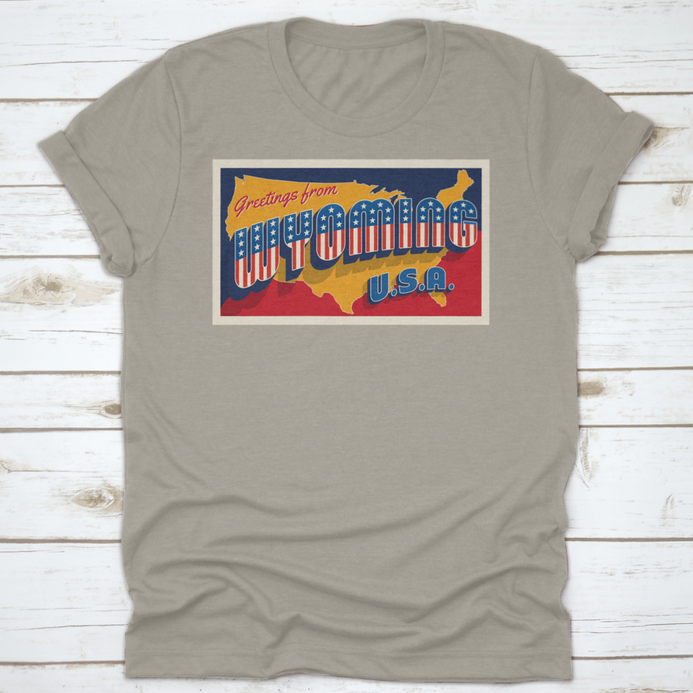 A retro postcard featuring the phrase 'Greetings From Wyoming USA' adorned with patriotic stars, showcasing the beauty of Wyoming.