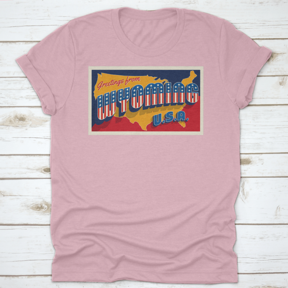 A retro postcard featuring the phrase 'Greetings From Wyoming USA' adorned with patriotic stars, showcasing the beauty of Wyoming.