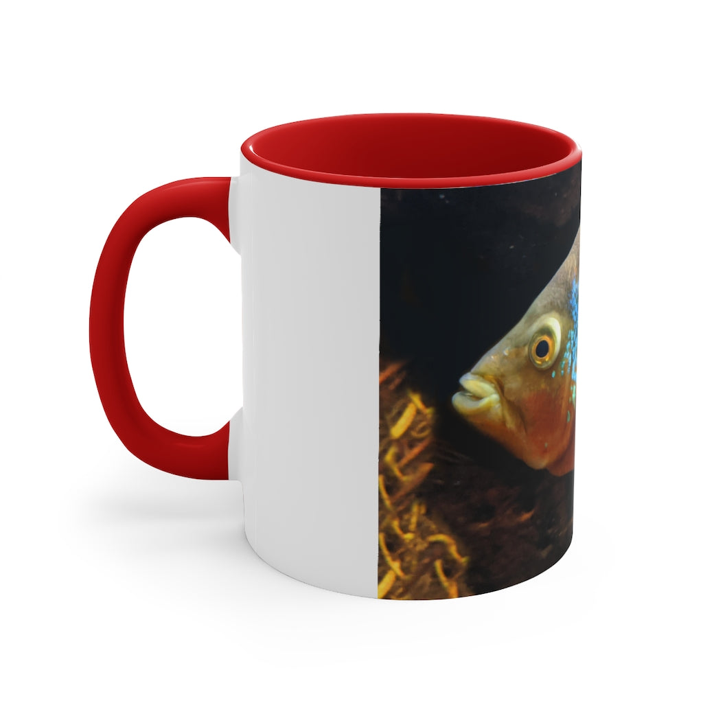 Grey and orange ceramic coffee mug with a C-handle, featuring a vibrant two-tone design.