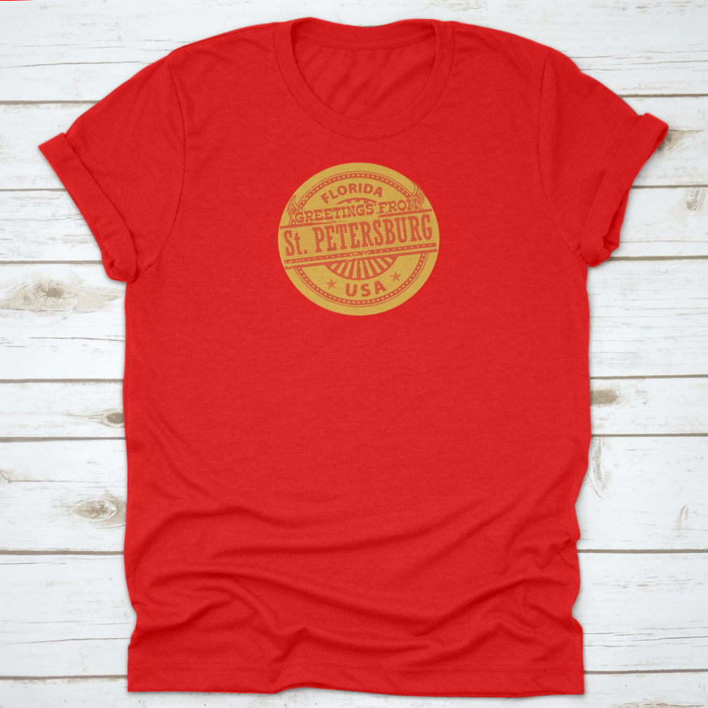Grunge Color Stamp T-shirt featuring 'Greetings From St. Petersburg, Florida' in vibrant colors on a soft cotton fabric.