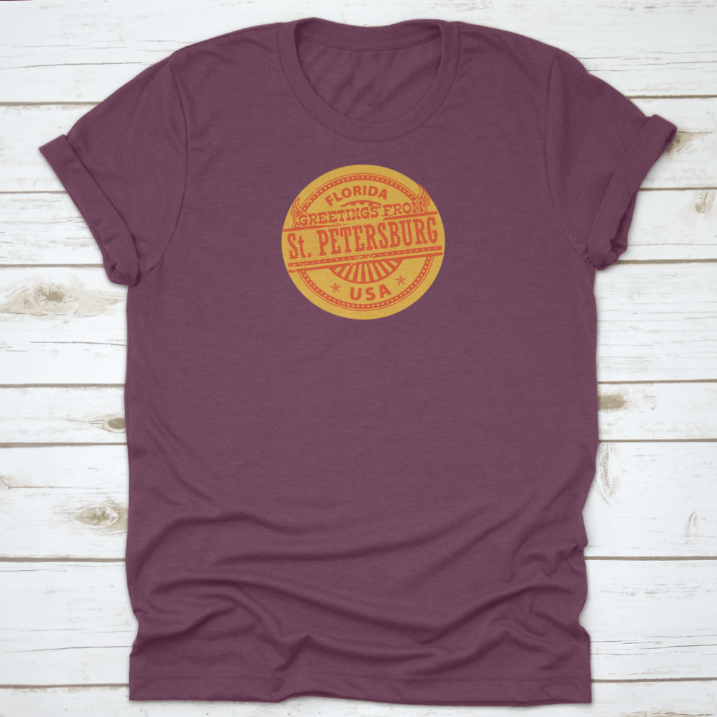 Grunge Color Stamp T-shirt featuring 'Greetings From St. Petersburg, Florida' in vibrant colors on a soft cotton fabric.