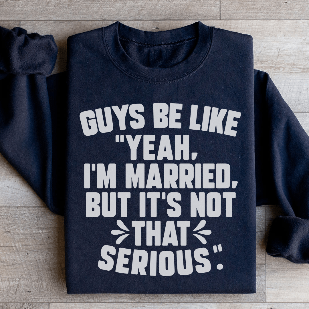 A cozy sweatshirt featuring the phrase 'Guys Be Like Yeah I'm Married', designed by top artists, showcasing a stylish and humorous design.