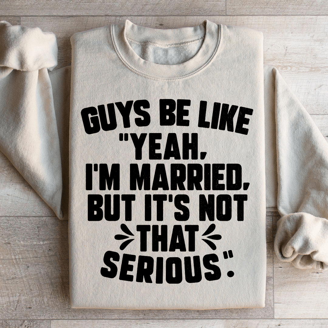 A cozy sweatshirt featuring the phrase 'Guys Be Like Yeah I'm Married', designed by top artists, showcasing a stylish and humorous design.