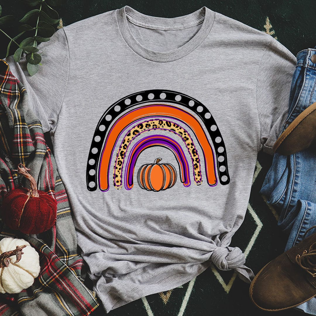 A colorful Halloween Rainbow Tee featuring spooky designs, made from 100% soft cotton, perfect for festive celebrations.
